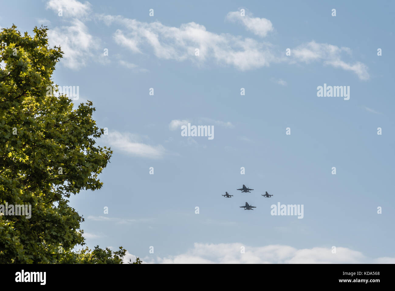 Madrid, Spain - October 12, 2017: Two F18 Hornet and two F5 jet fighters flying in Spanish National Day Parade. Several troops take part in the army parade for Spain's National Day. King Felipe VI, Queen Letizia and Spanish Prime Minister Mariano Rajoy presided over the parade. Juan Jimenez/Alamy Live News Stock Photo