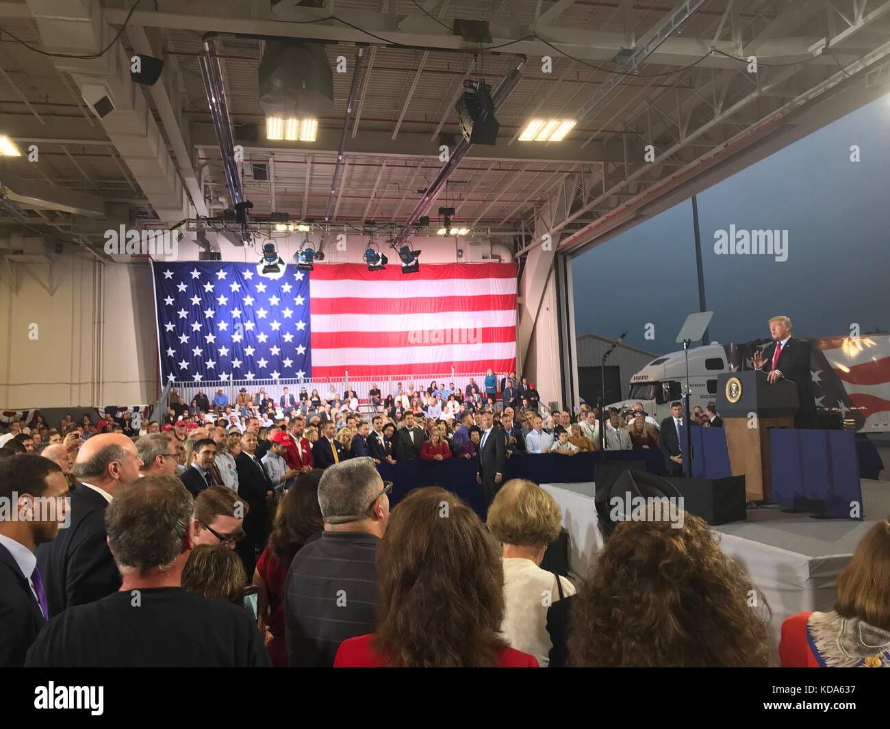 Middletown, United States Of America. 11th Oct, 2017. U.S. President Donald Trump delivers an address on his tax reform proposal during an event at the Harrisburg International Airport October 11, 2017, in Middletown, Pennsylvania. Credit: Planetpix/Alamy Live News Stock Photo