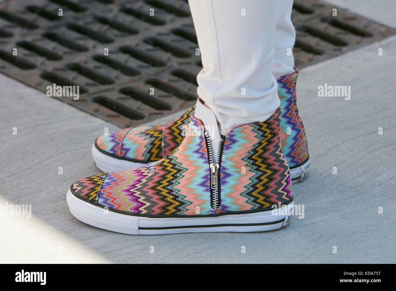MILAN - SEPTEMBER 20: Man with Converse shoes with colorful pattern before  Alberto Zambelli fashion show, Milan Fashion Week street style on September  Stock Photo - Alamy
