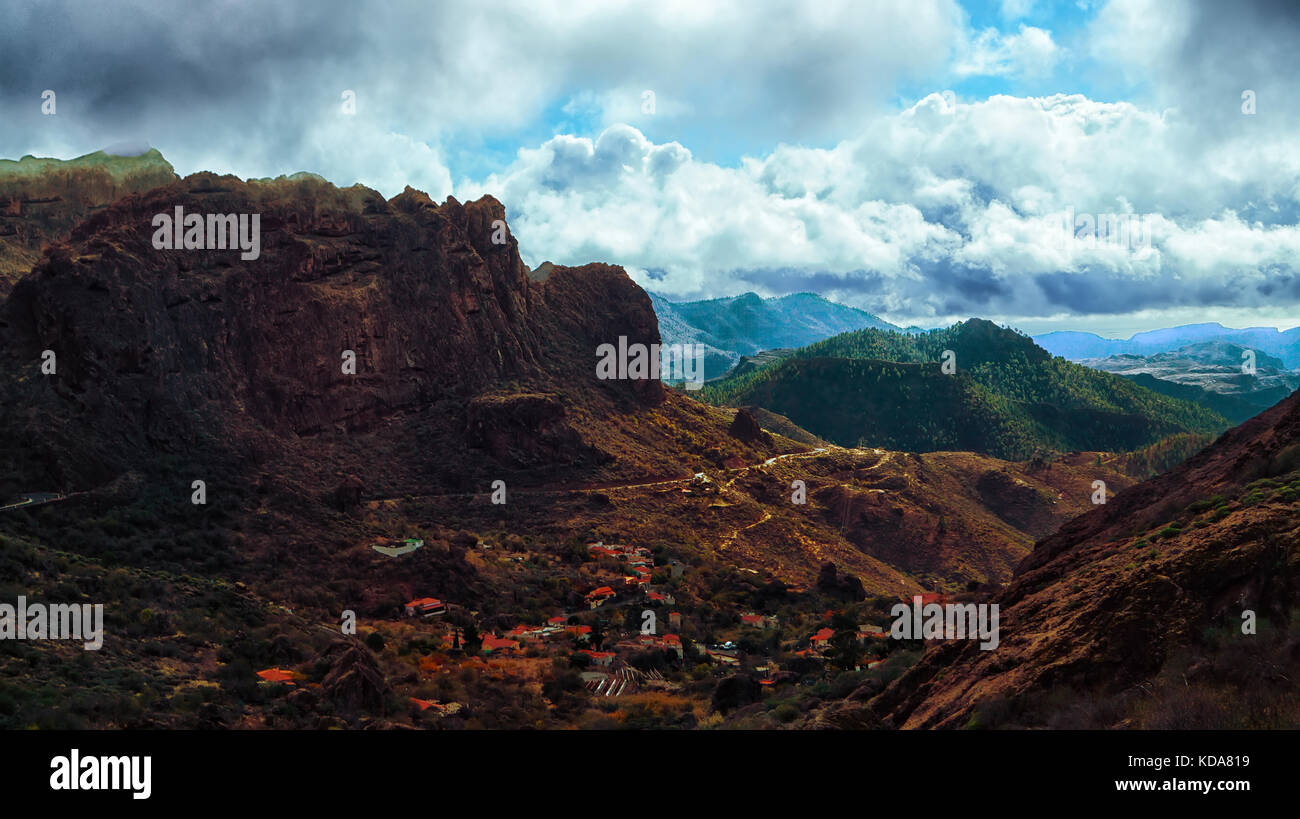 A beautiful wild mountain scape and curves winding road high view in ...