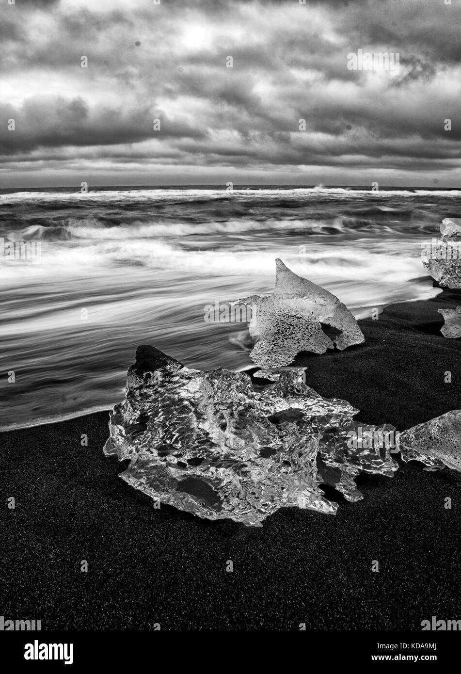 Ice on Monochrome Beach Stock Photo