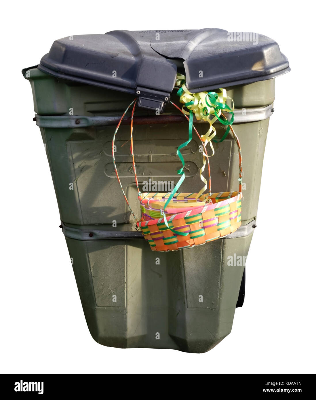 Easter basket hanging from isolated shabby trash can Stock Photo Alamy