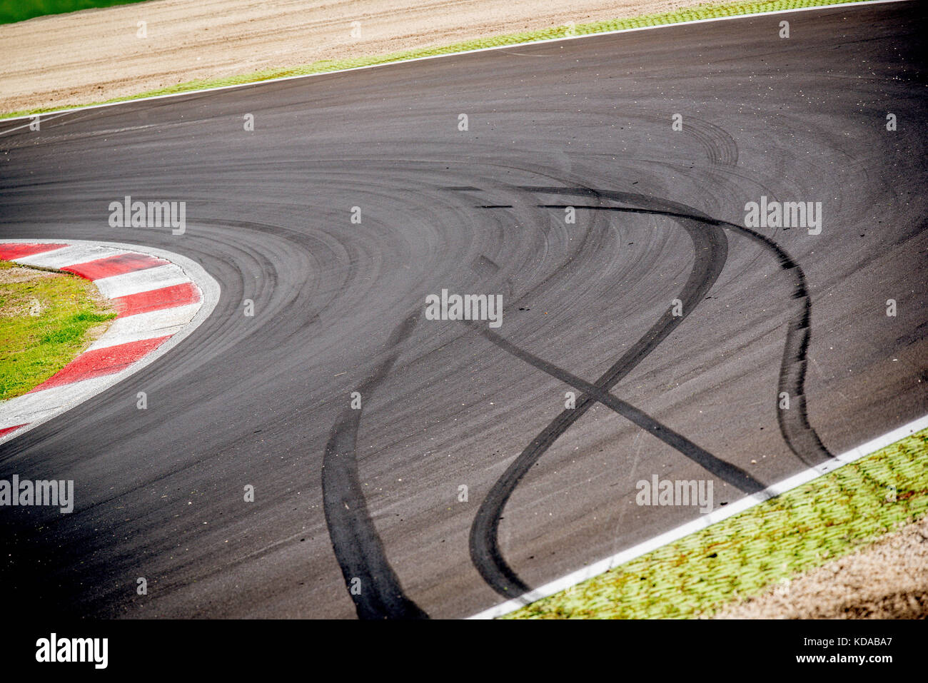 Motorsport racing track round nobody view and car slammed brakes signs concept of stay in instead going out of track close up Stock Photo