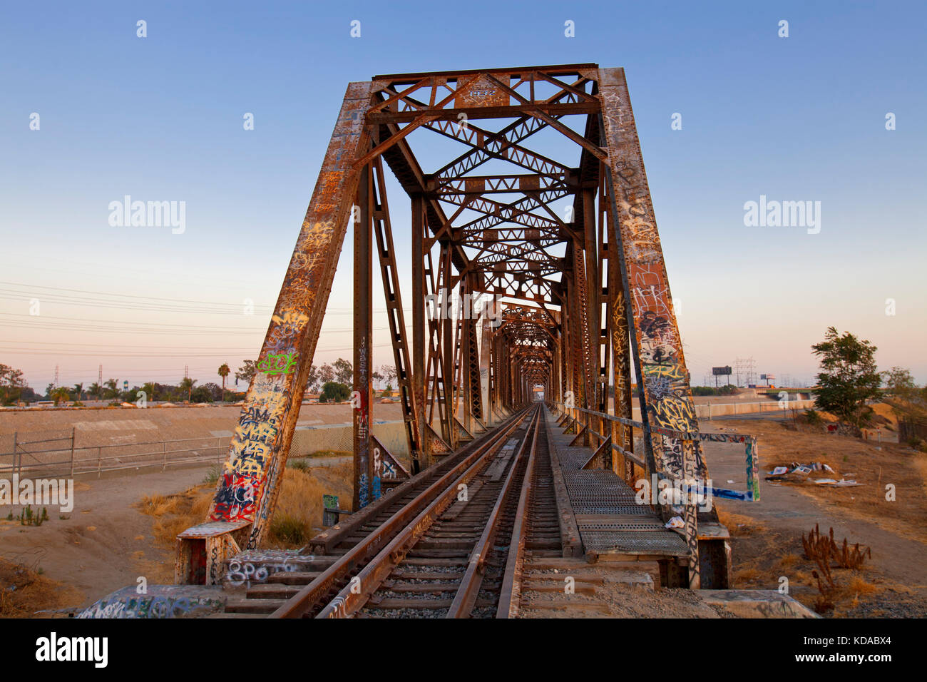 Train trestle bridge over Los Angeles River, South Gate, Los Angeles County, California, USA Stock Photo