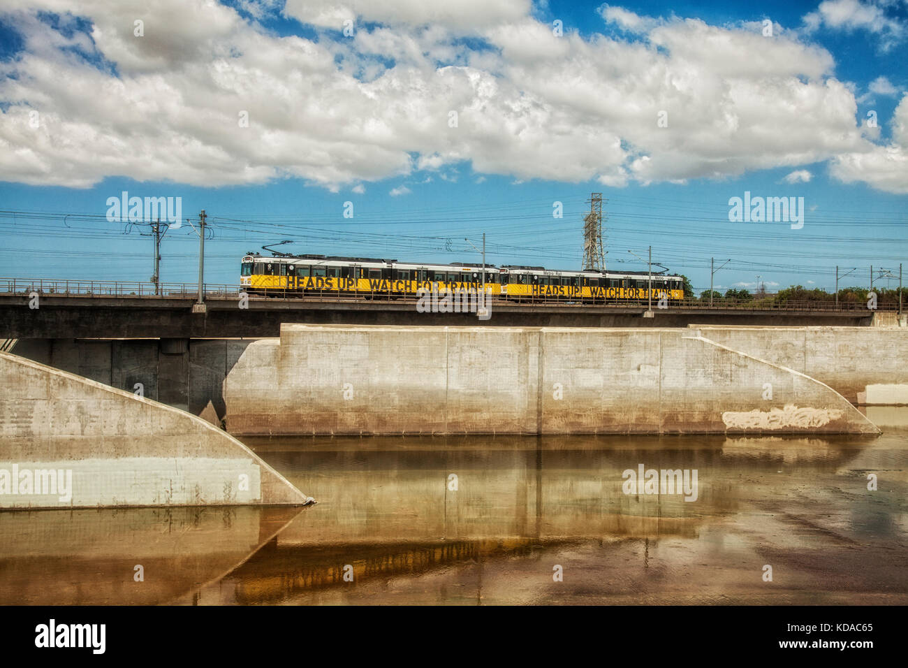 Los Angeles Metro Rail along Los Angeles River, Long Beach, California, USA Stock Photo