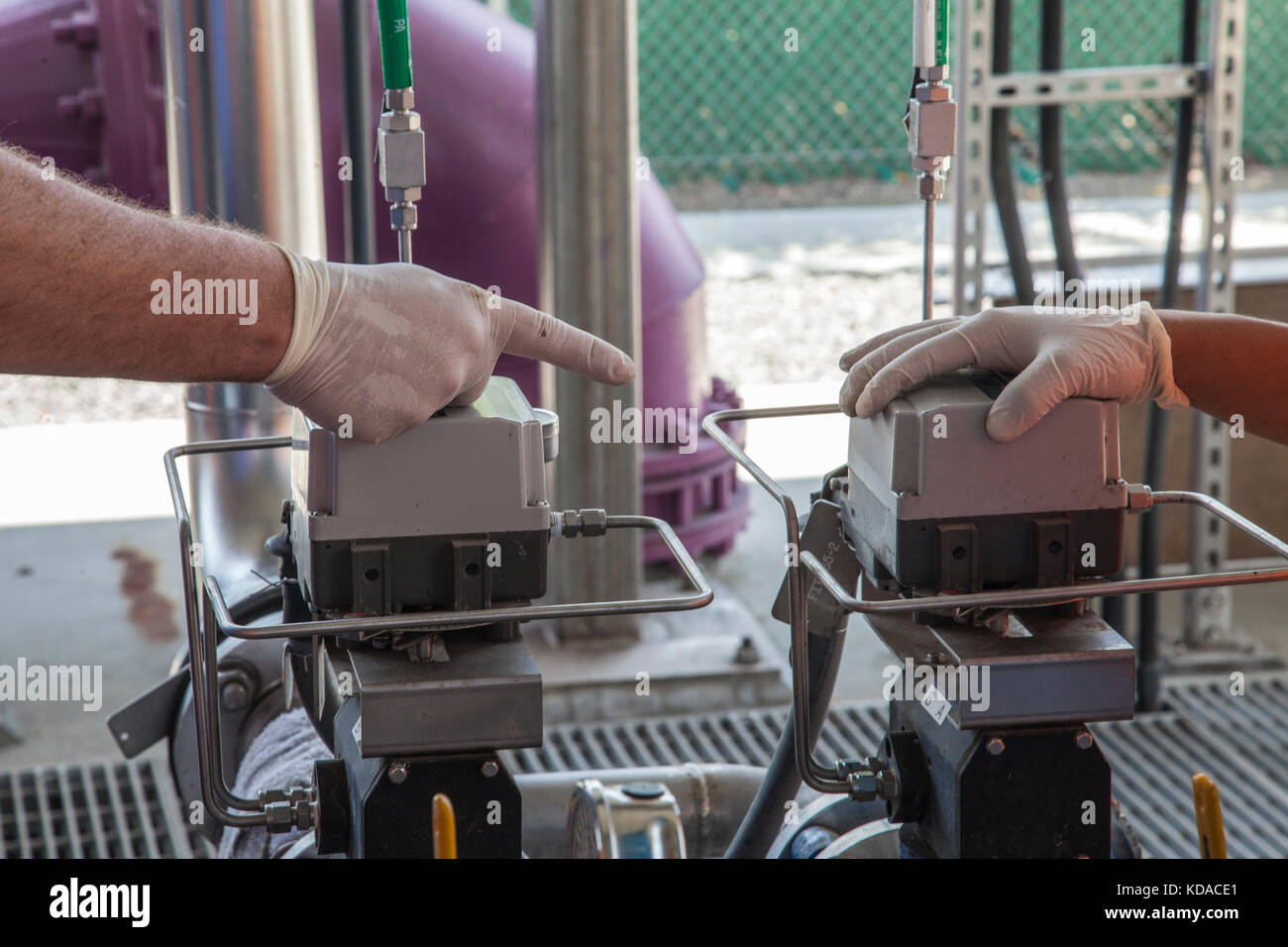 Working on Microfiltration process that removes bacteria, fine particles and sediments from treated water. Leo J. Vander Lans Advanced Water Treatment Stock Photo