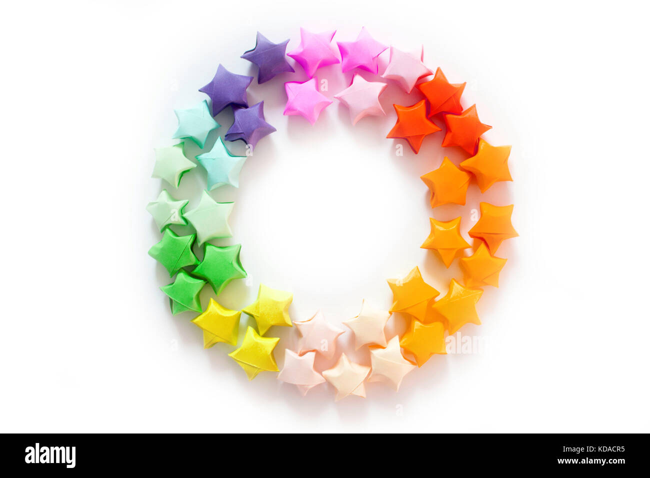 Colorful folded paper star or origami lucky star to use as frame Stock ...