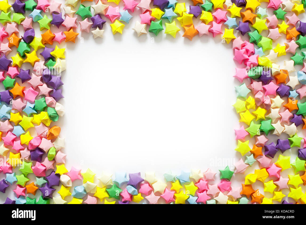 Colorful folded paper star or origami lucky star to use as frame Stock ...