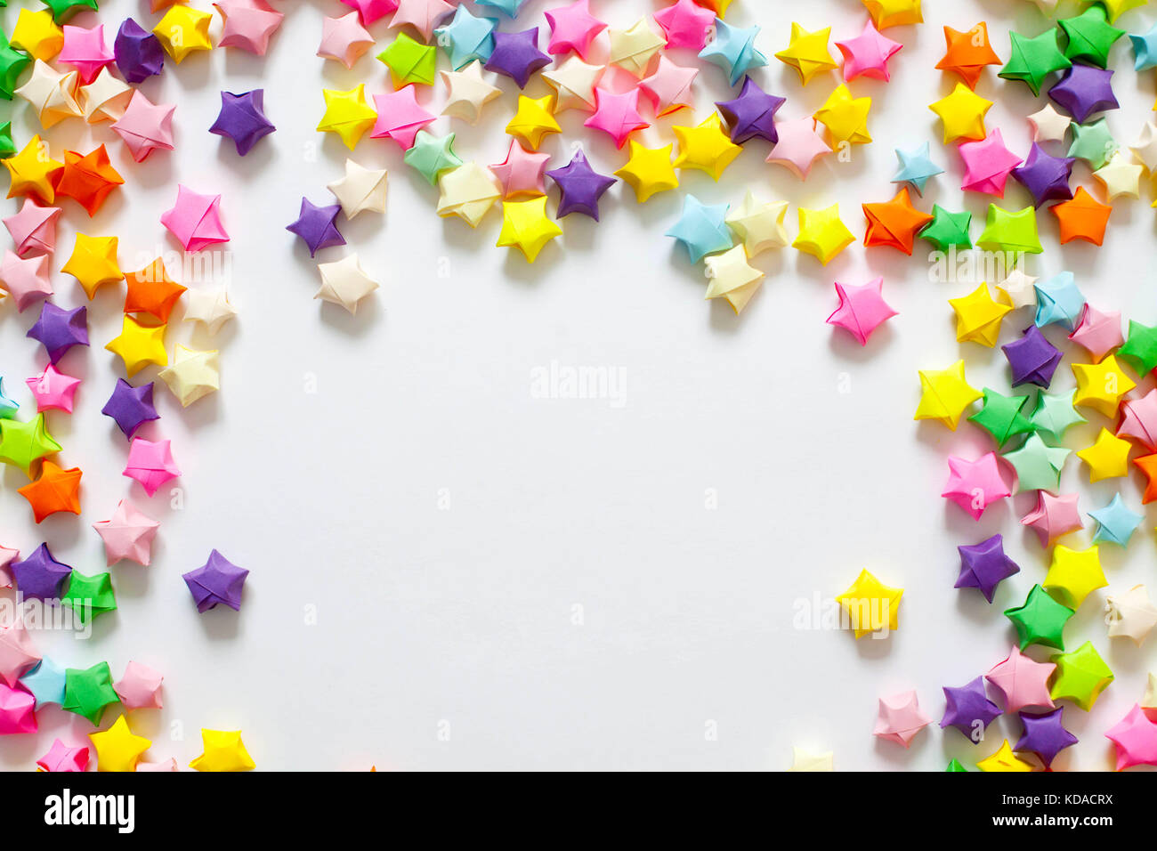 Colorful folded paper star or origami lucky star to use as frame Stock ...