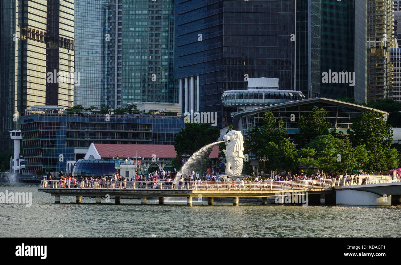 Singapore - Jun 12, 2017. People visit the Merlion at sunset in ...