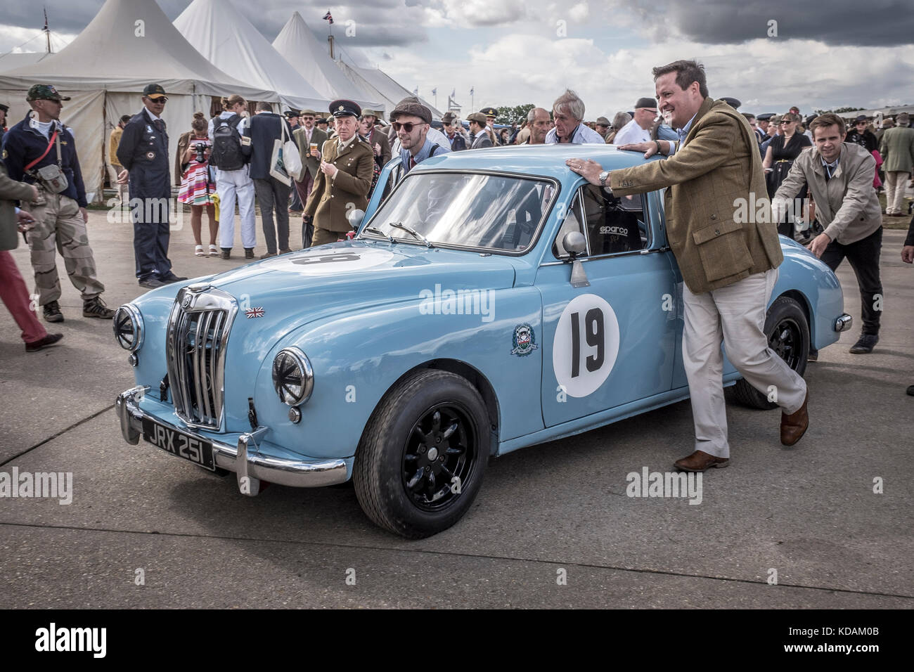 Bruce Chapman's 1957 MG Magnette ZB is pushed through the paddock at the 2017 Goodwood Revival, Sussex, UK. St Mary's Trophy entrant. Stock Photo
