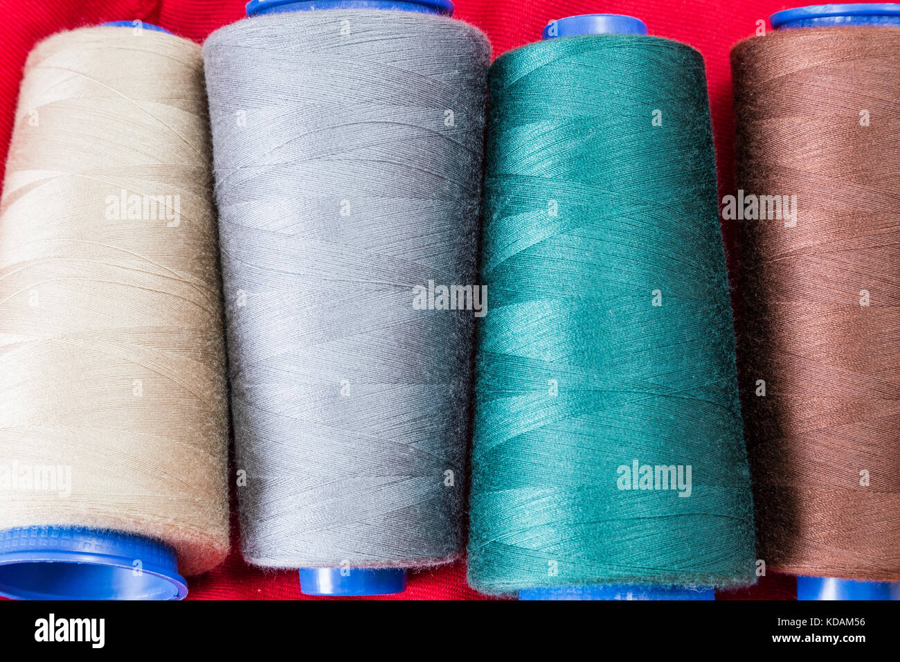 Several spools of thread of different colors and sizes Stock Photo Alamy