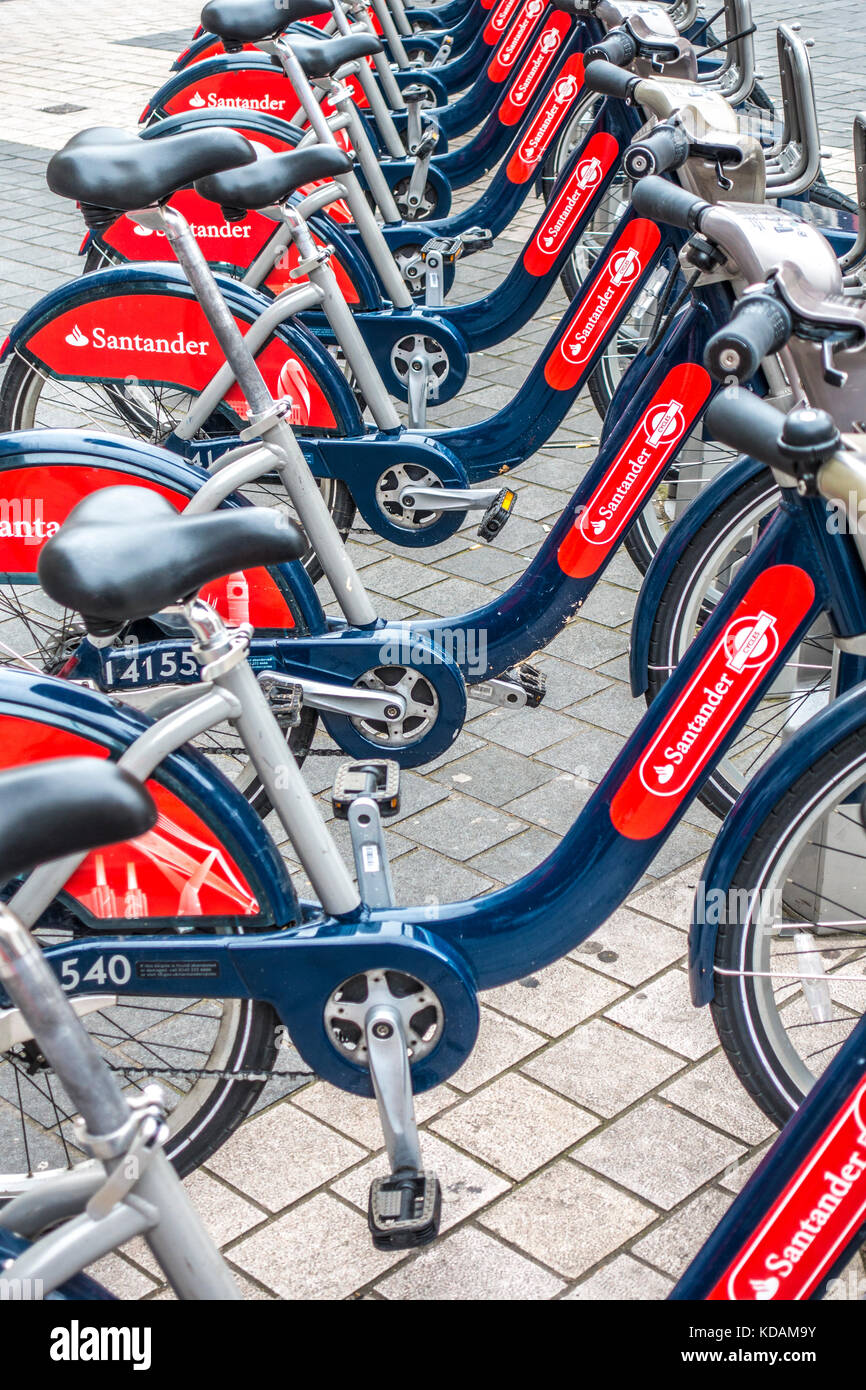 Transport for London - TFL - a line of parked Santander pay-as-you-go cycles, at a docking station in South Kensington, London, England, UK. Stock Photo
