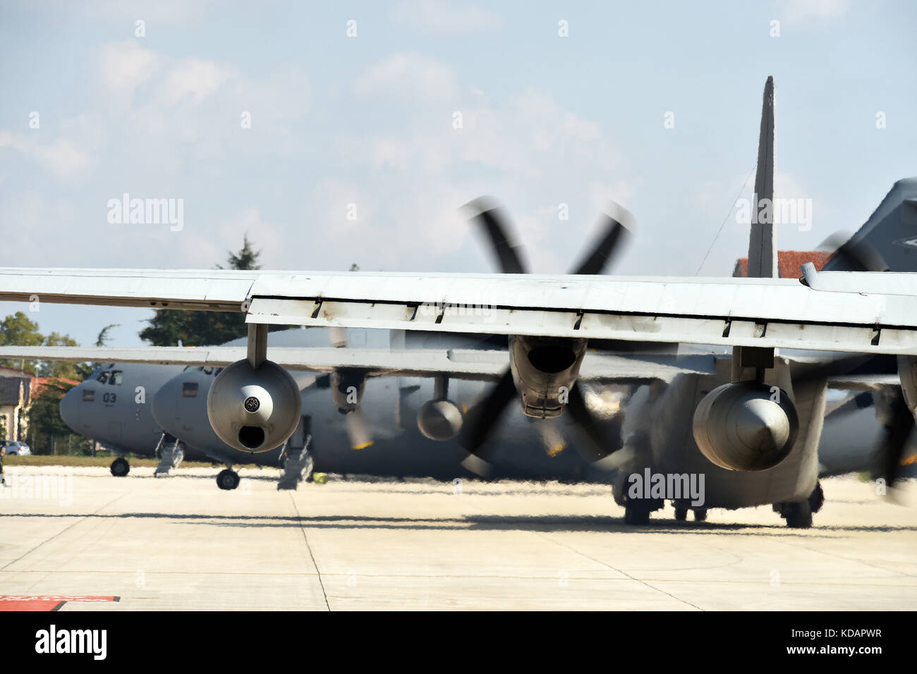 Two of five C-130 Hercules airplanes and two C17 Globemaster III Aircraft from Papa Air Base, Hungary bearing 400 paratroopers line up for departure Stock Photo