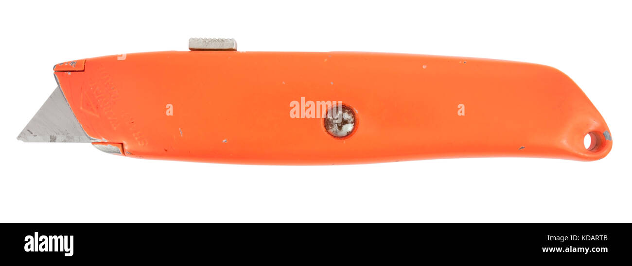 Isolated orange box cutter / utility knife for blade showing. Horizontal. Stock Photo