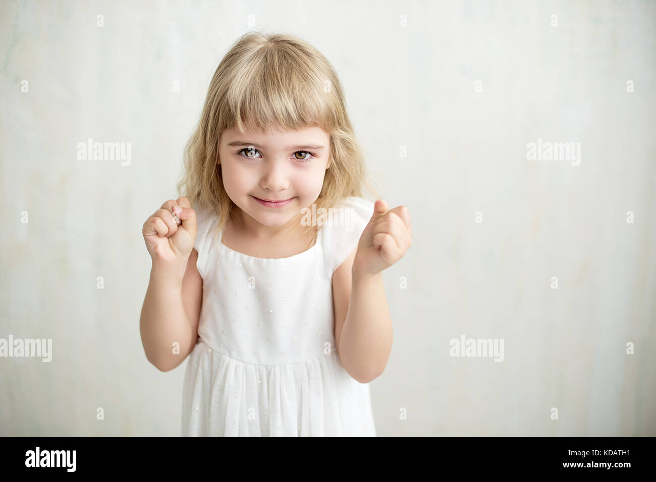 Girl folding hands hi-res stock photography and images - Alamy
