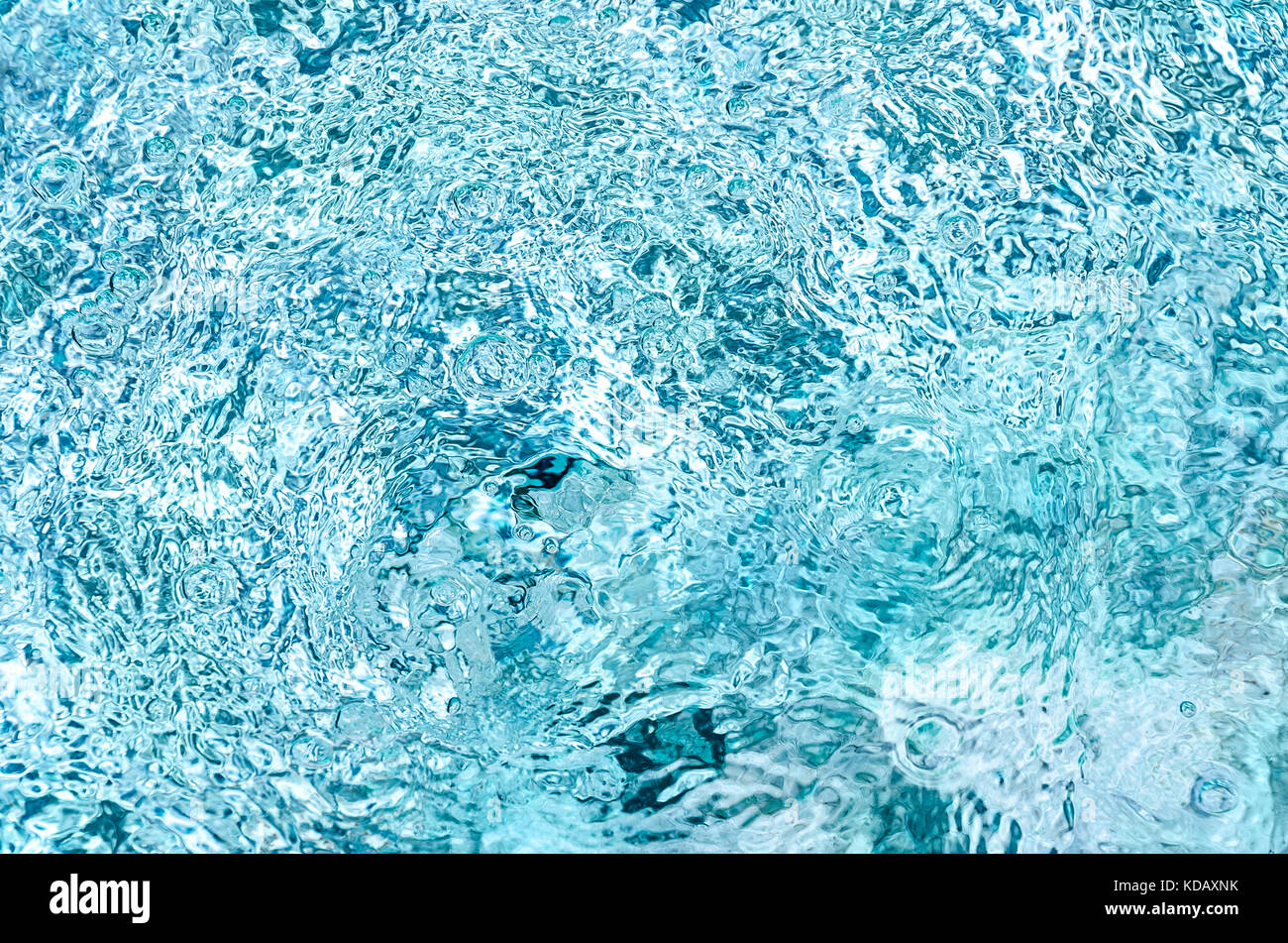 Blue swimming pool rippled water detail Stock Photo
