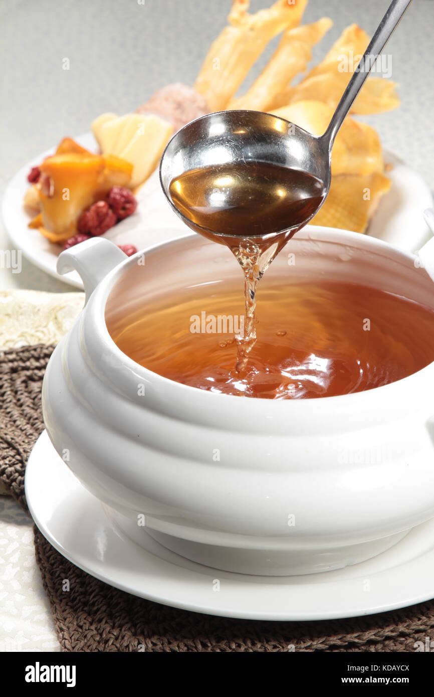 chinese chicken or seafood broth Stock Photo Alamy