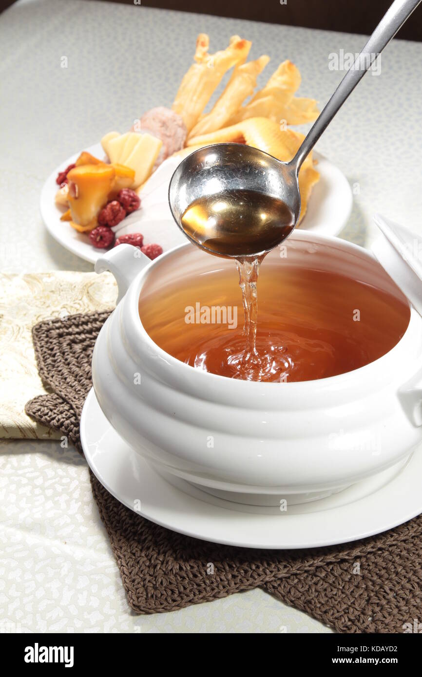 chinese chicken or seafood broth Stock Photo Alamy
