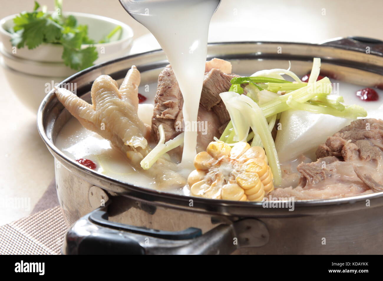 chinese chicken or seafood broth Stock Photo Alamy