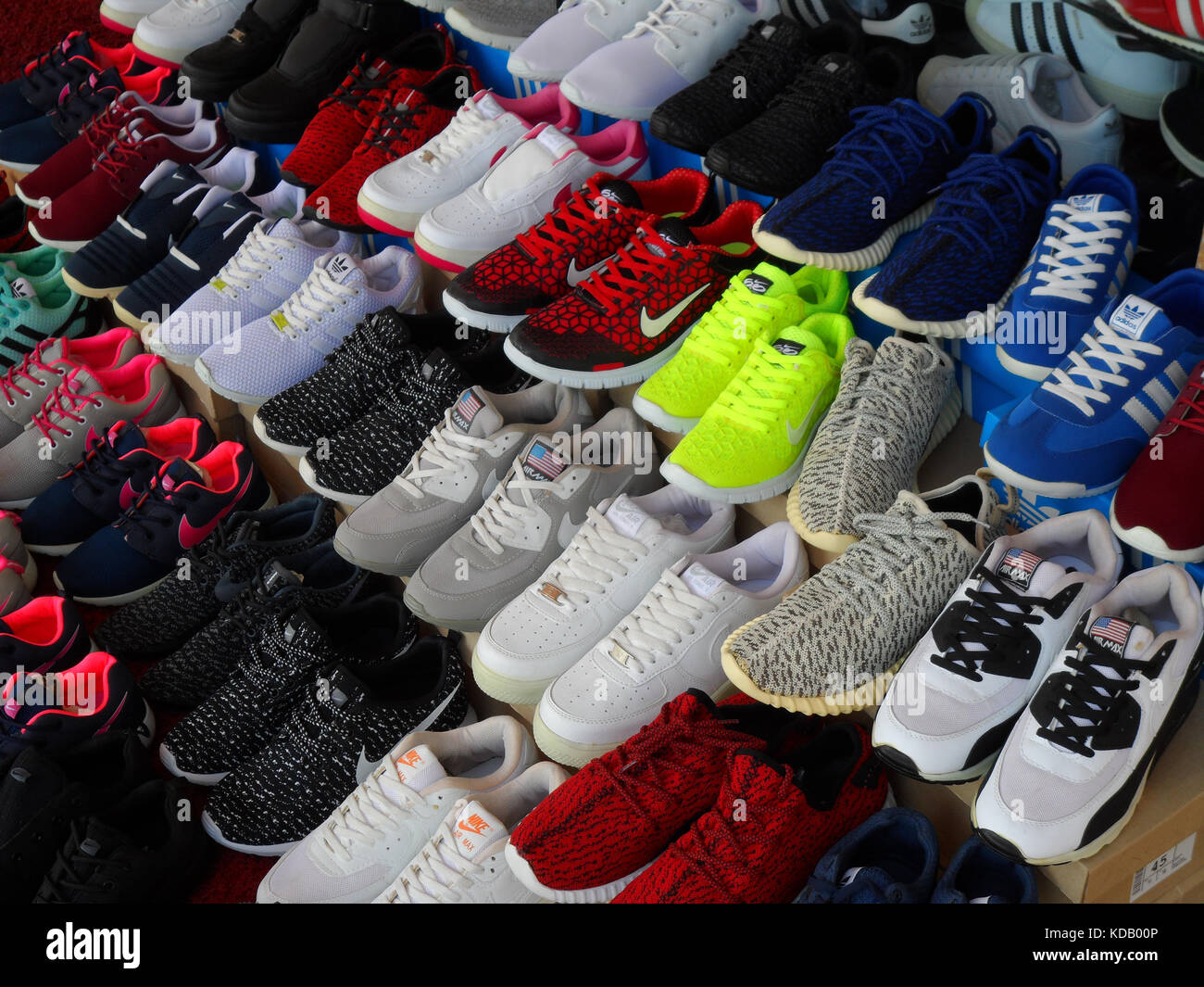A display of training shoes for sale in a shop in Icmeler, Mugla province,  Turkey Stock Photo - Alamy