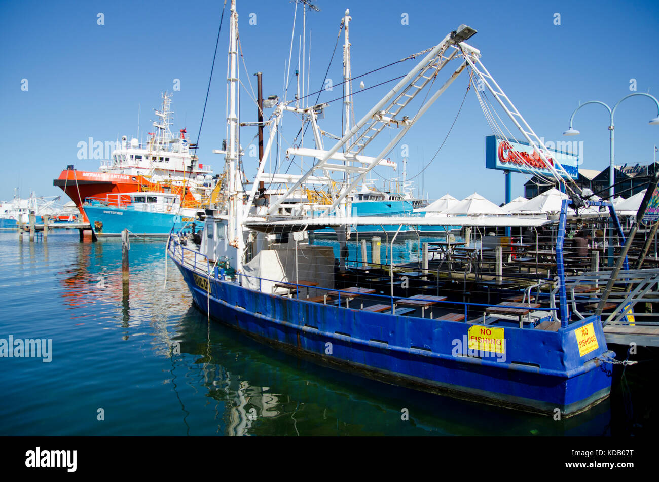 Restaurant boat at Fishing Boat Harbour, Fremantle.  Popular tourist attraction with restaurants and cafes Stock Photo