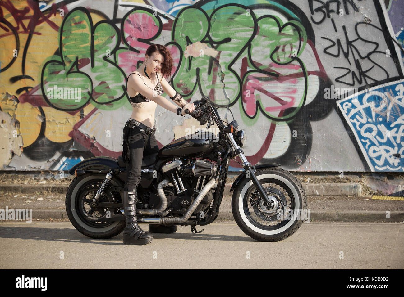 Girl On A Motorcycle Wearing Alternative Fashion Style Stock Photo Alamy