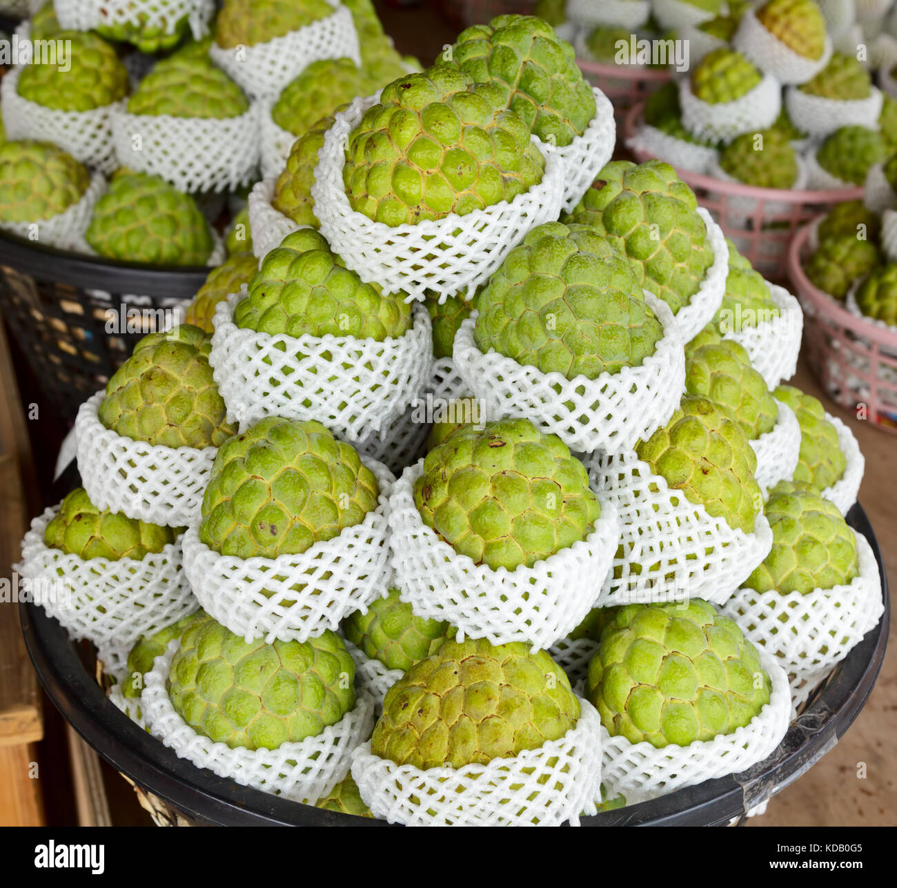 Freshly harvested Custard apples or Buddha Head Fruits at a market in