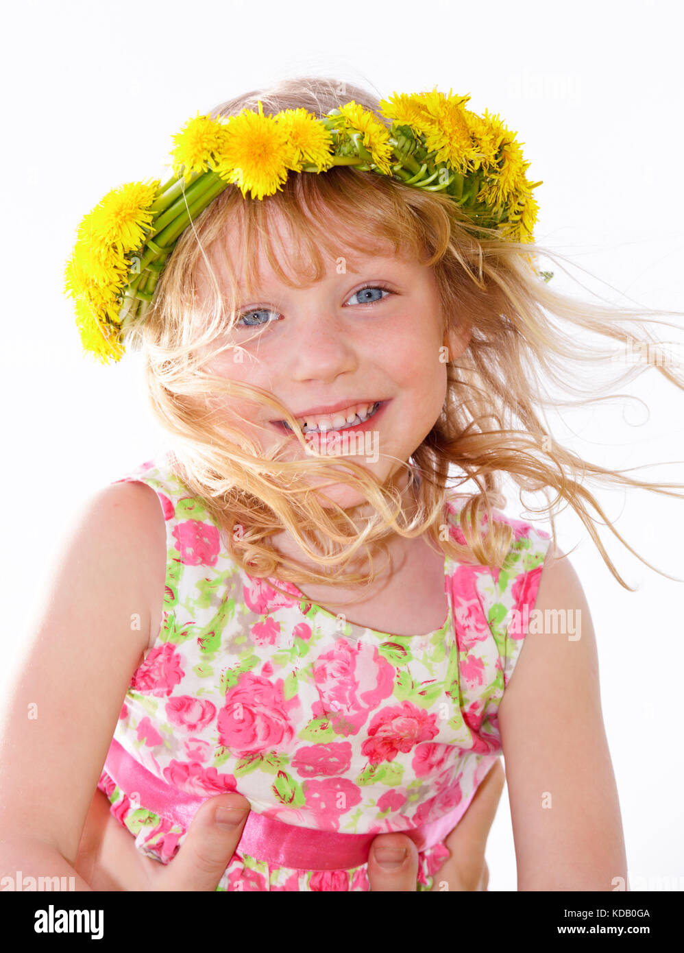 Portrait of cute little girl with dandelion wreath Stock Photo - Alamy