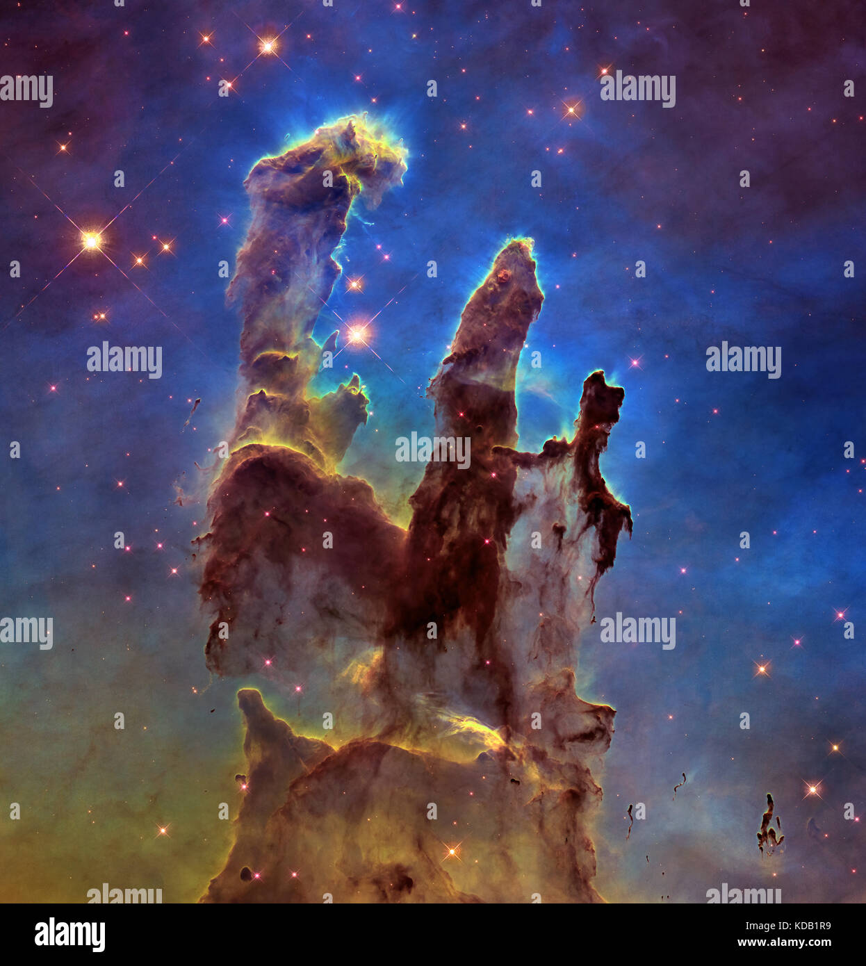 Deep space object: Pillars of creation in Eagle Nebula (M16) in the constellation Serpens, elements of this image furnished by NASA Stock Photo