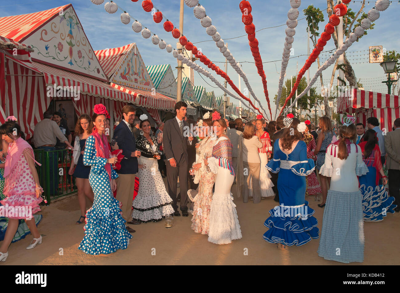 April Fair, Women wearing a traditional flamenco dress, Seville, Region