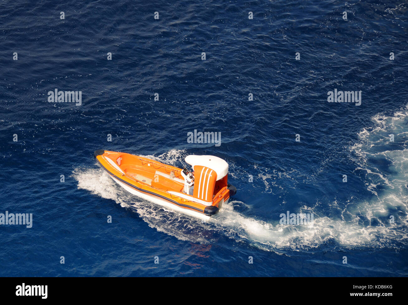 Boat conducting search and rescue operation at sea Stock Photo - Alamy