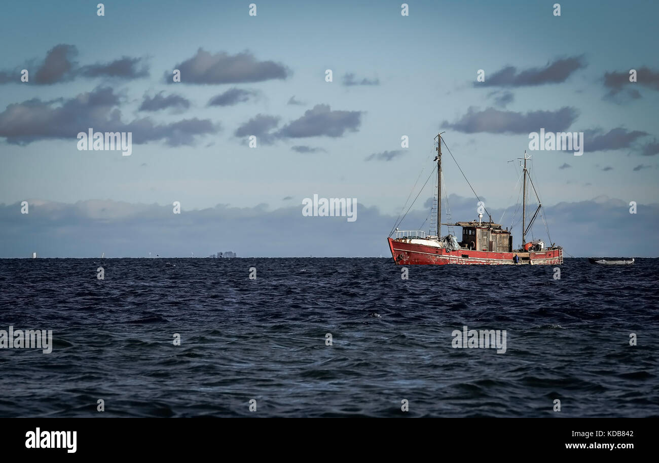 Danish fishing boat in deep blue sea Stock Photo Alamy