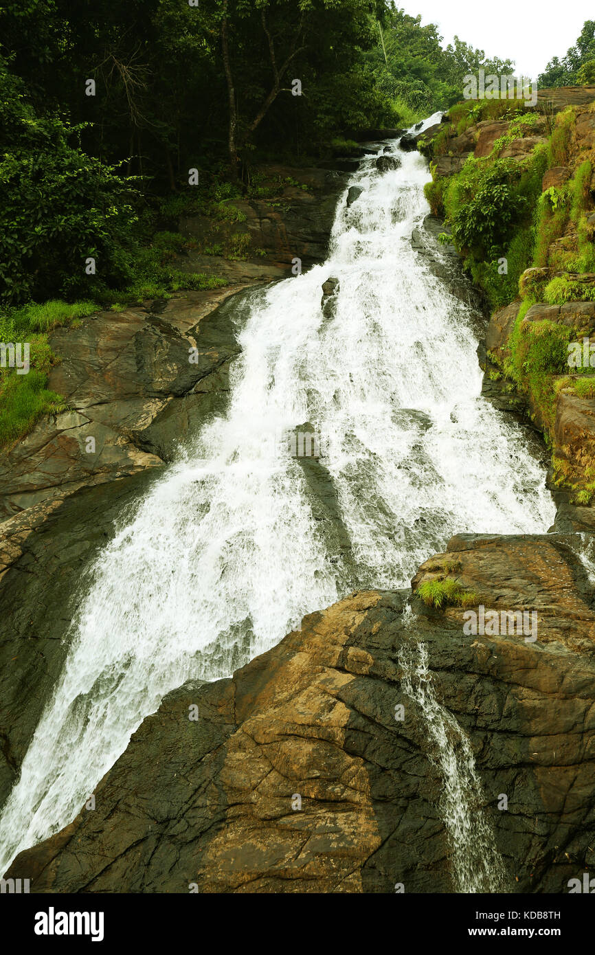 A waterfall in the mountain Stock Photo - Alamy