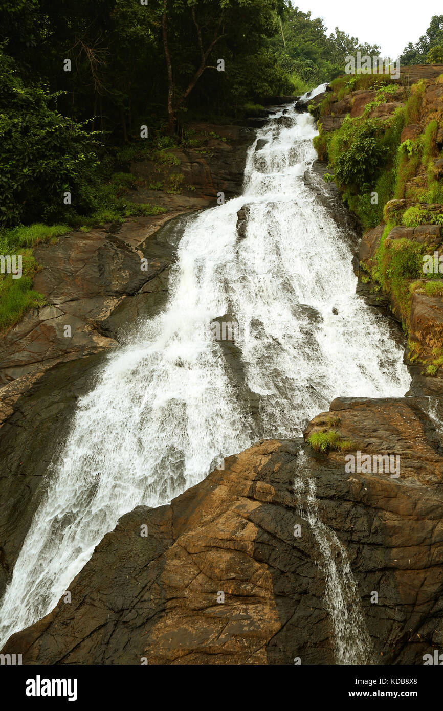 A waterfall in the mountain Stock Photo - Alamy
