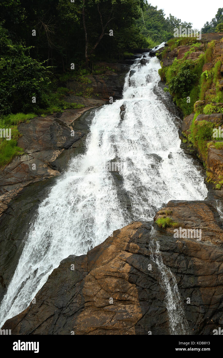 A waterfall in the mountain Stock Photo - Alamy
