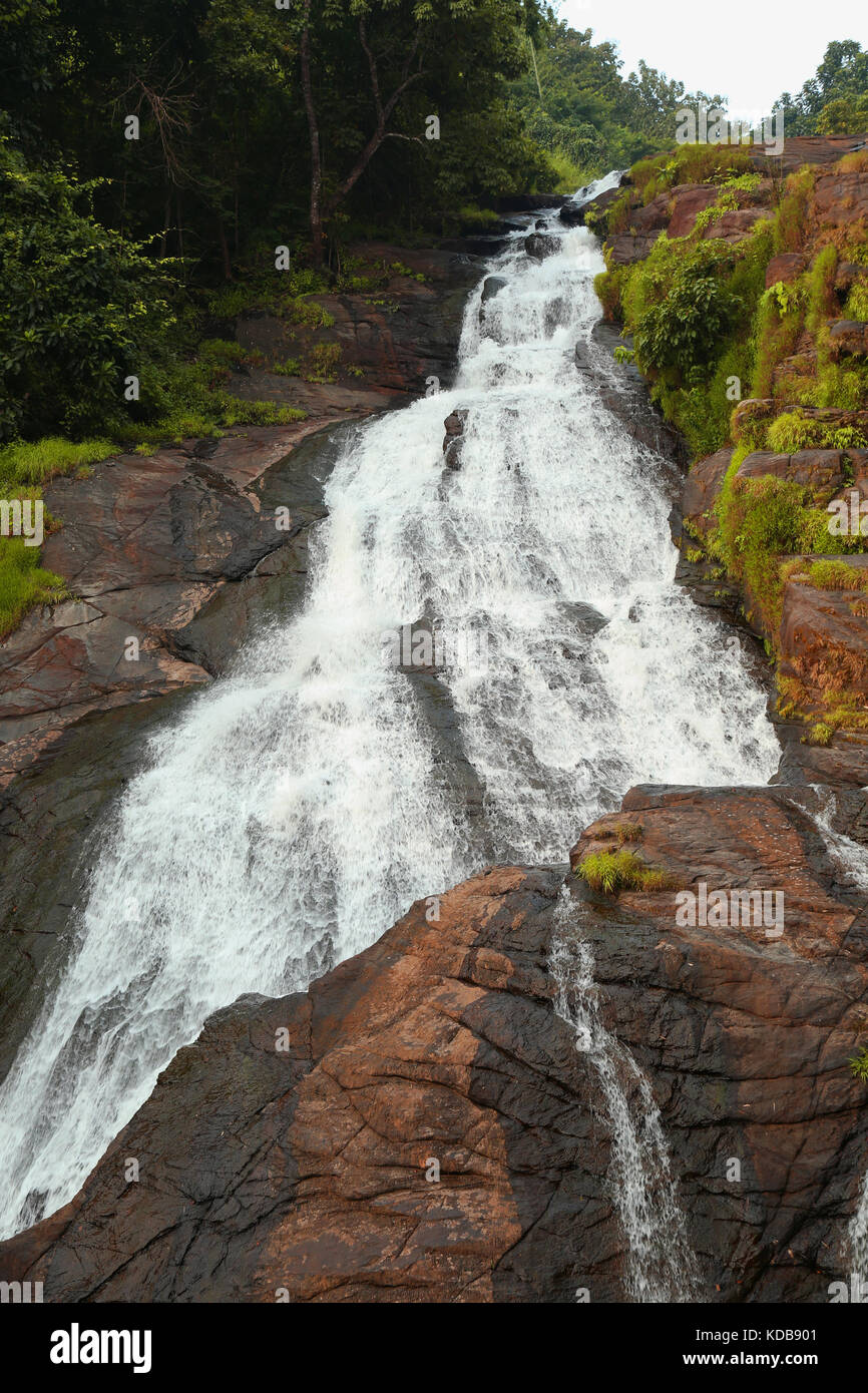 A waterfall in the mountain Stock Photo - Alamy