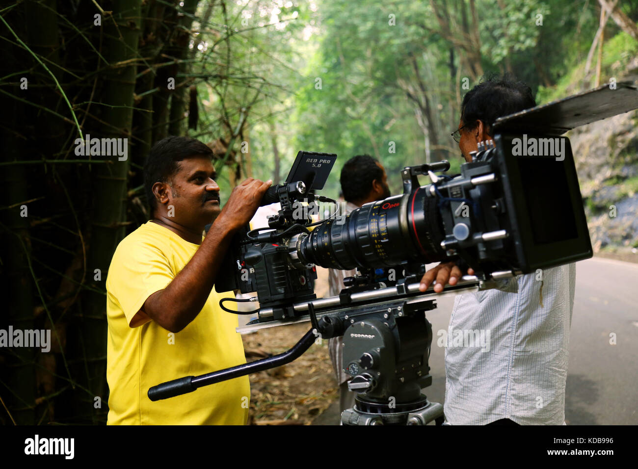 Video camera operator on nature background, film shooting spot Stock Photo  - Alamy