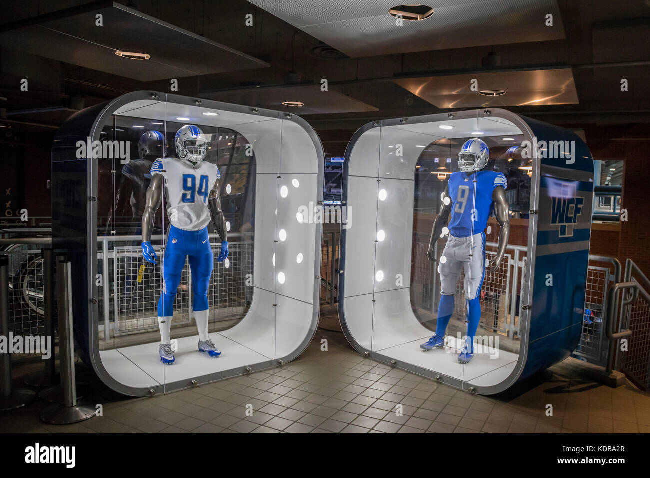 Detroit, Michigan - Uniforms of the Detroit Lions on display at Ford Field. The home uniform is at right; the away uniform is at left. Stock Photo