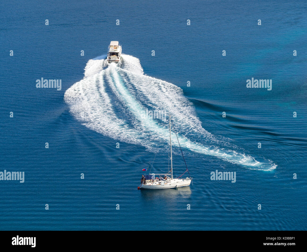 Sailing yacht and motor boat in Croatia, windy summer on the boat