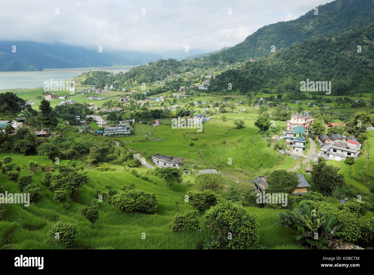 A small town in a very green valley Stock Photo - Alamy
