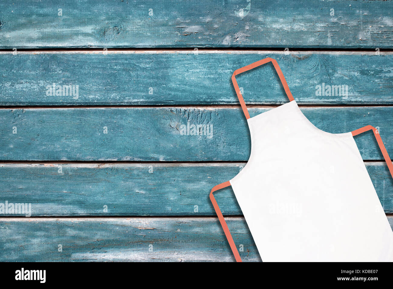 White apron on blue Stock Photo - Alamy