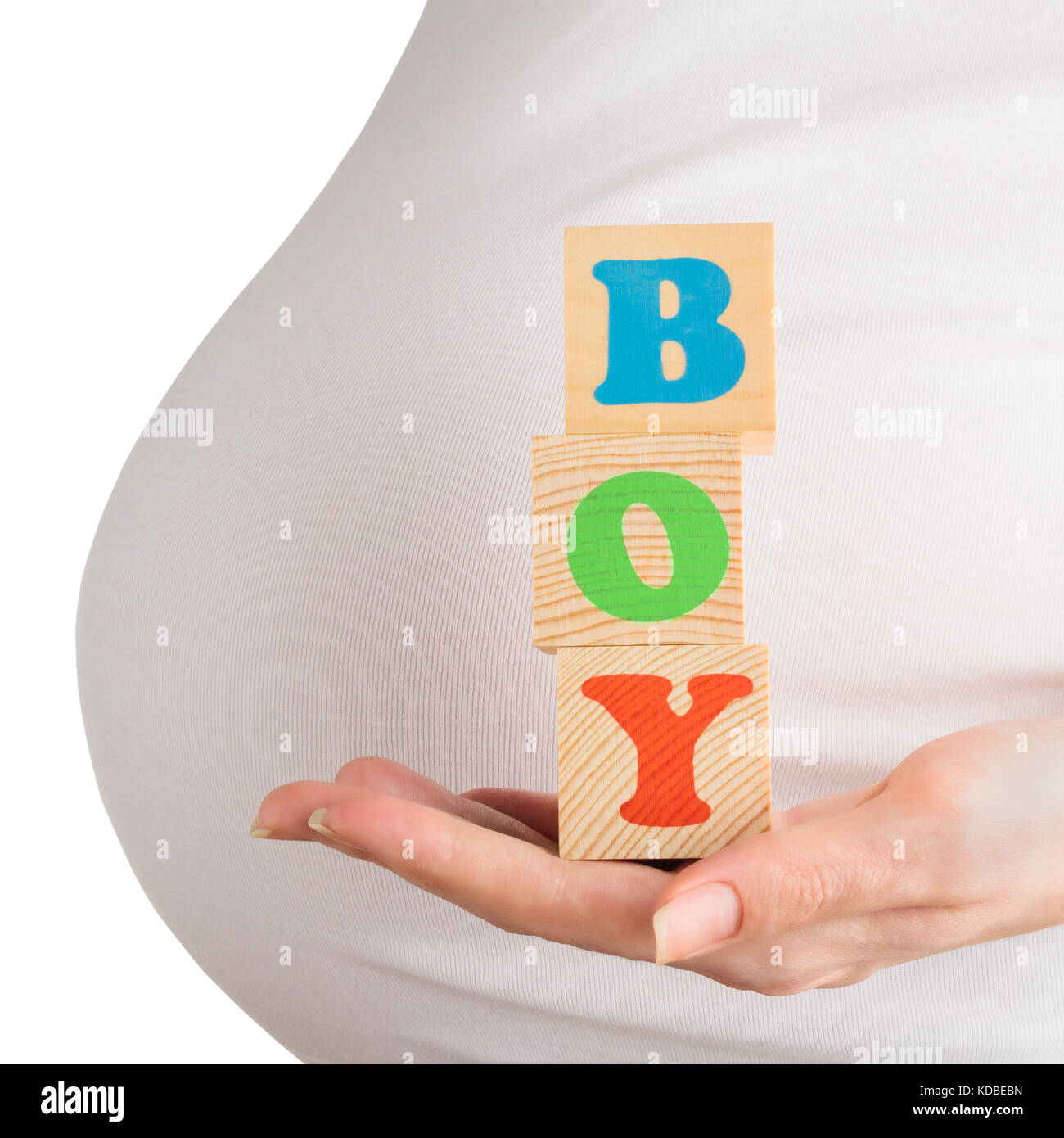 Pregnant woman holding boy sign Stock Photo