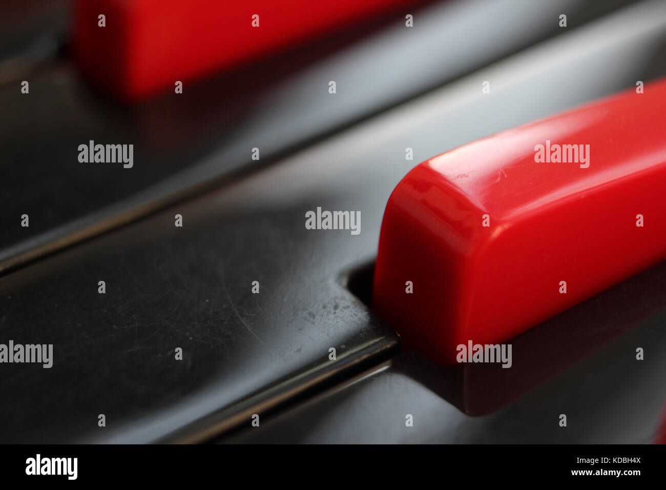 Closeup of black and red keys of melodica keyboard Stock Photo Alamy