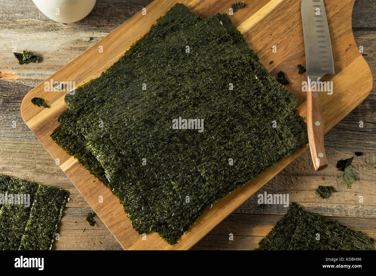 Organic Green Dry Roasted Seaweed Sheets on a Board Stock Photo - Alamy