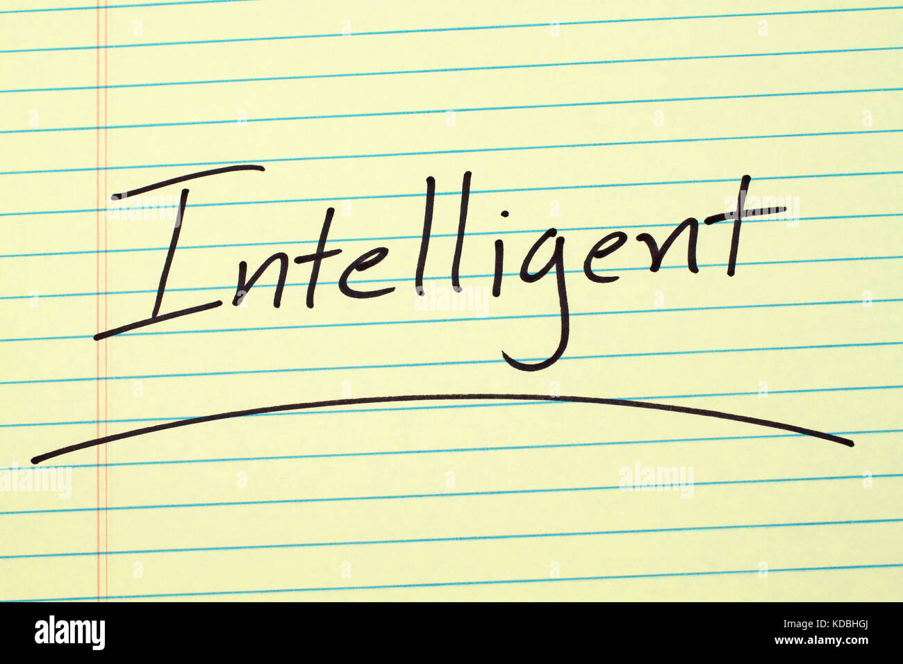 the-word-intelligent-underlined-on-a-yellow-legal-pad-stock-photo