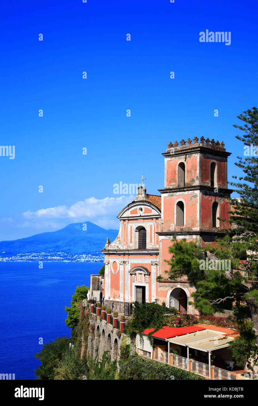 Church Santissima Annunziata, Vico Equense, Peninsula of Sorrento, Campania, Italy. Volcano Vesuvius in the background. Stock Photo
