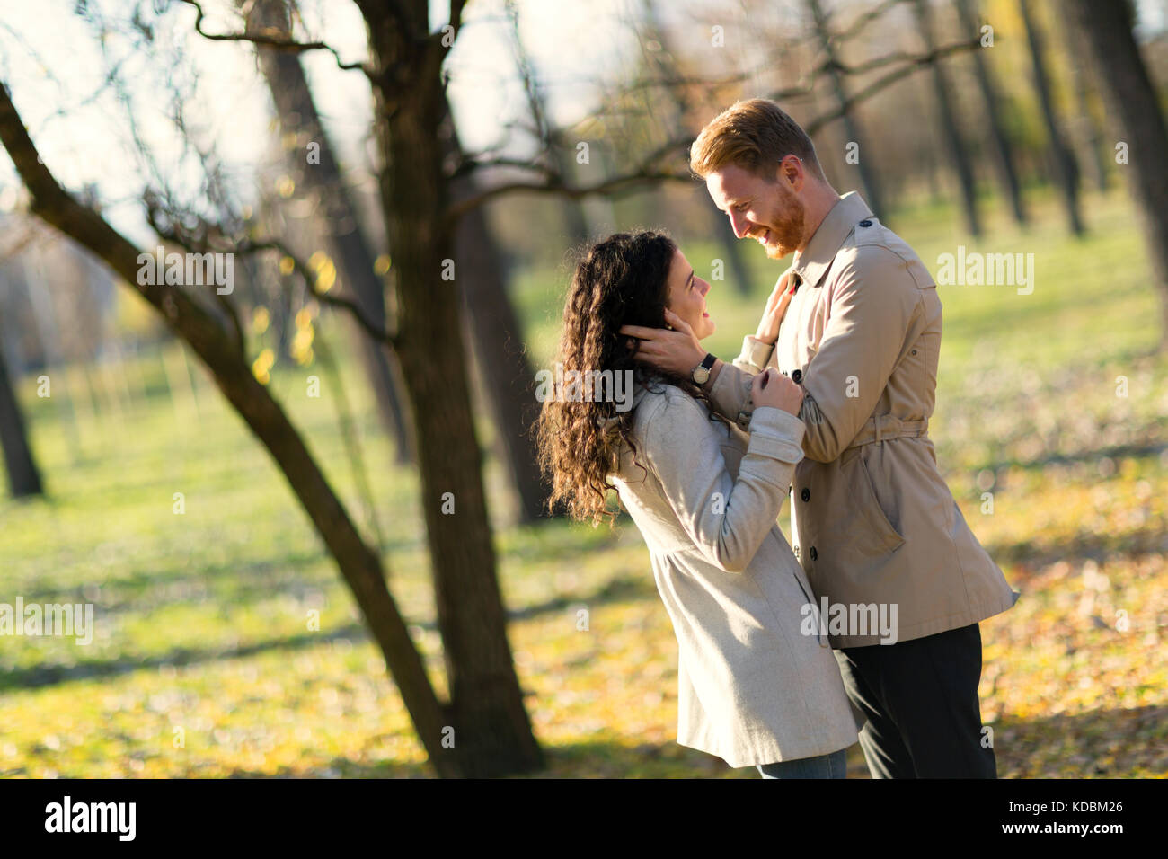 Young couple having romantic date in park Stock Photo - Alamy