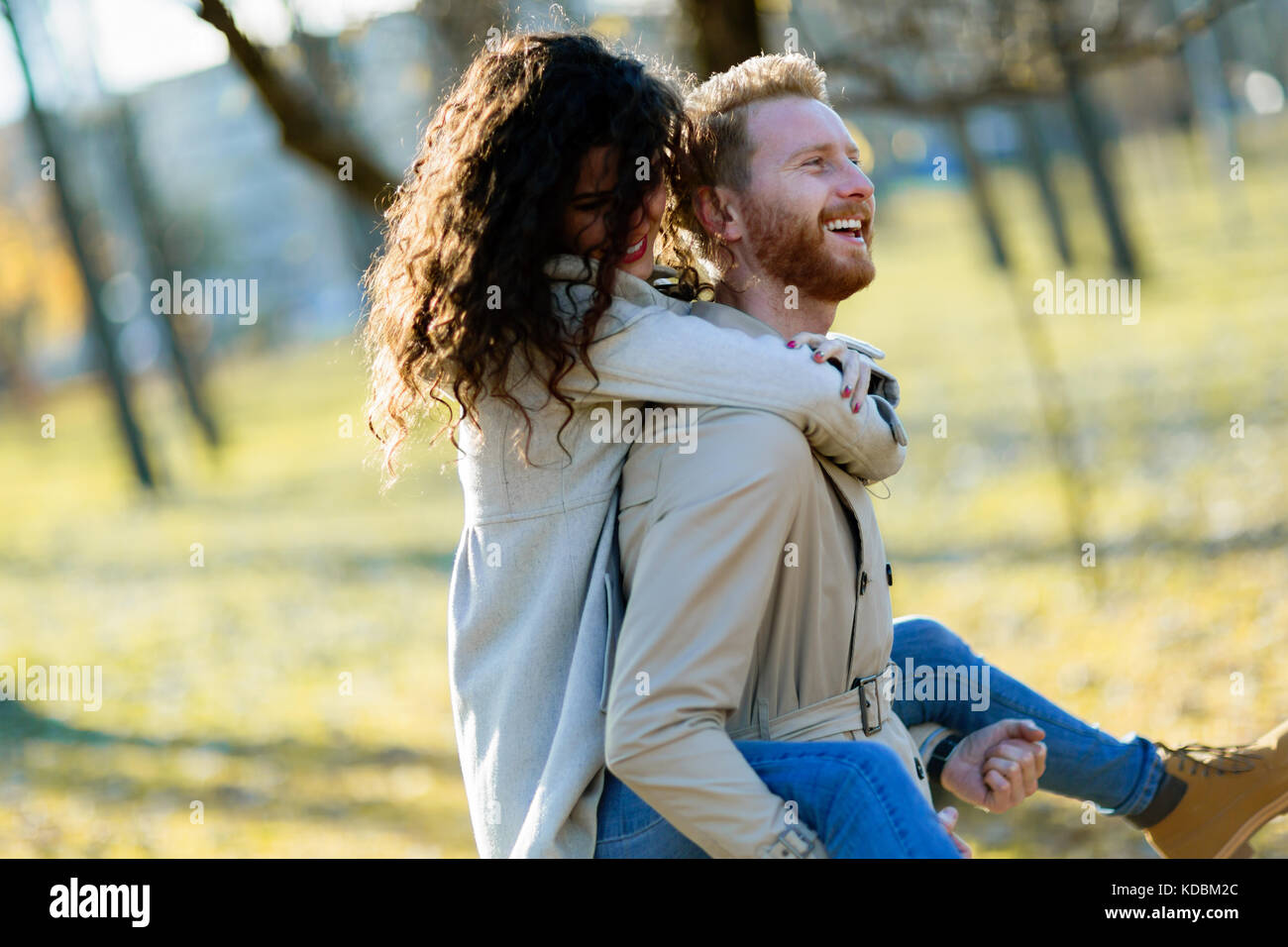 Young couple having romantic date in park Stock Photo - Alamy