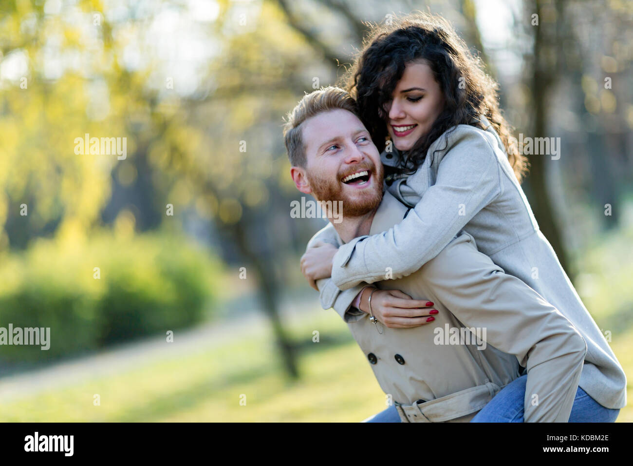 Young couple having romantic date in park Stock Photo - Alamy